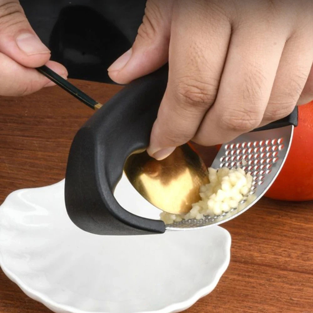 كسارة الثوم اليدوية المصنوعة من الفولاذ المقاوم للصدأ 