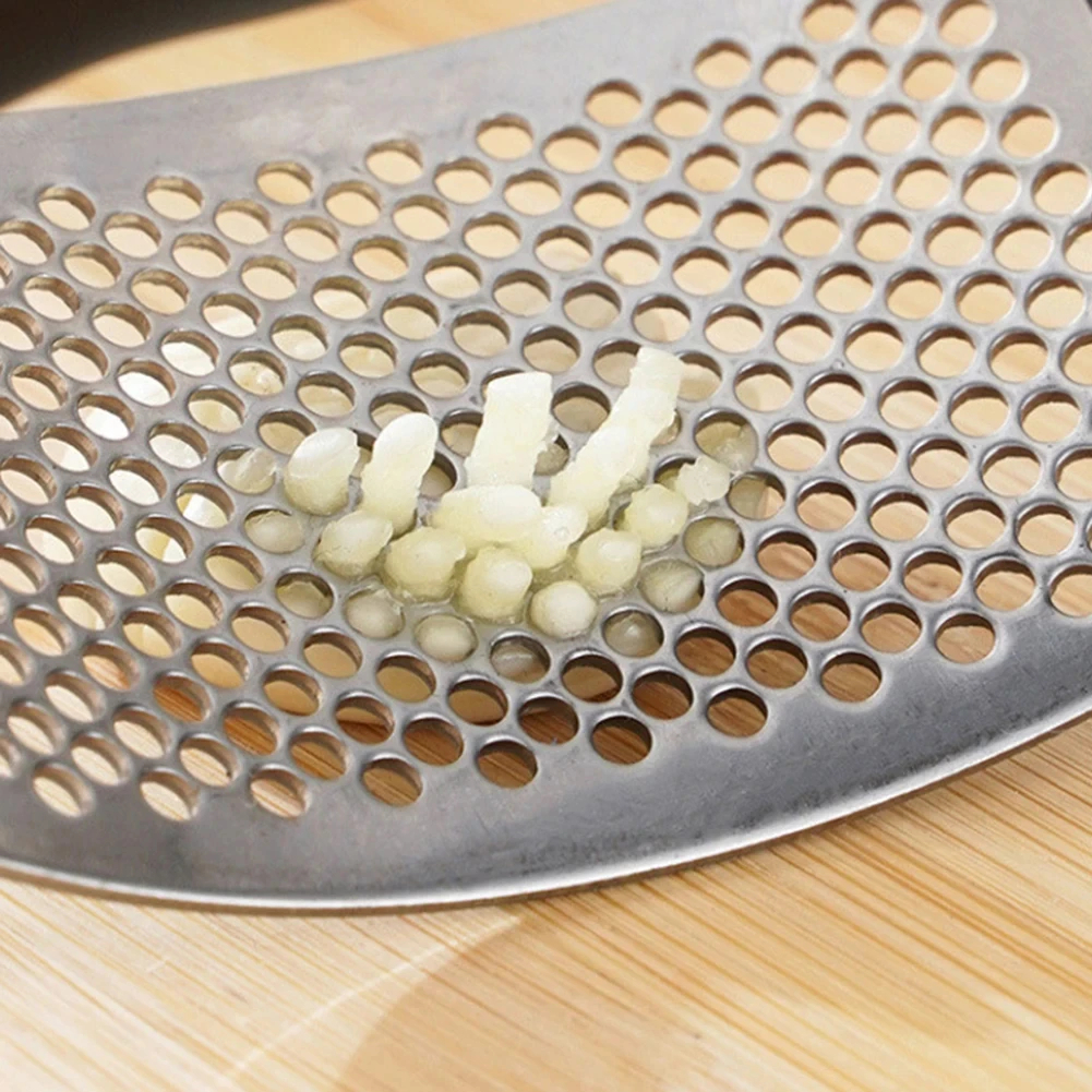 كسارة الثوم اليدوية المصنوعة من الفولاذ المقاوم للصدأ 