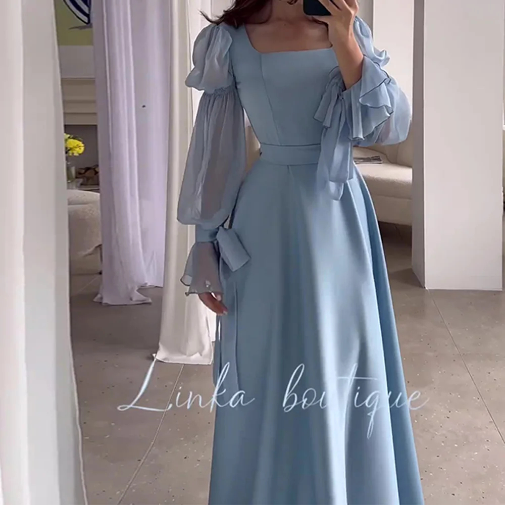 فستان نسائي من الساتان بأكمام منفوخة وياقة مربعة